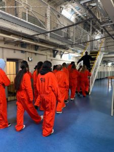 Prisoners in jumpsuits