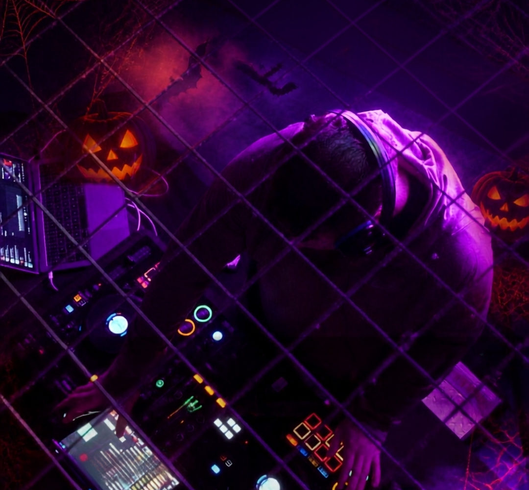 DJ in a historic wing of Shrewsbury Prison during the Halloween Silent Disco event